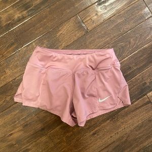 Pink Nike athletic shorts